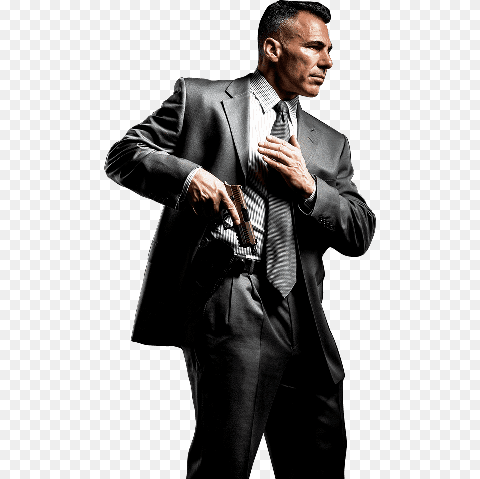 Guy With Gun Man With Gun, Person, Suit, Hand, Formal Wear Free Png